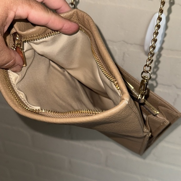 INC Elegant crossbody Tan faux Leather Bag
Fold over adjustable straps - Picture 5 of 8